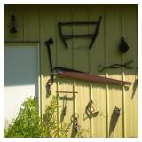 antique tools on side of pole shed - lot of 13