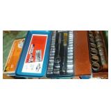 3 socket sets in boxes.