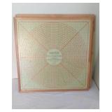 The Hostess Doily Stretcher in box, measures