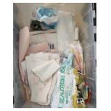 lot of linens, tea spoons and crafted holder,