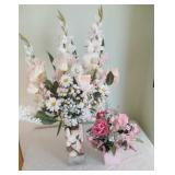 2 floral arrangements, one with vase of sea shells