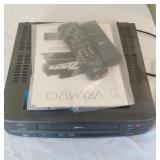 Zenith VHS player and 2 remotes - VRM4120