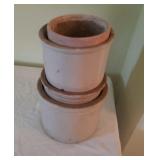 3 stone crocks and 1 terra cotta pot, largest