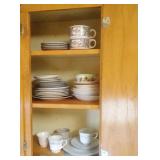 contents of cupboard - coup mugs, misc plates,