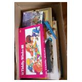 box of board games - Tiddly Winks, Life, Scrabble,