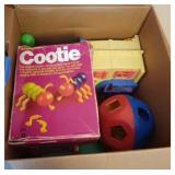 suitcase of Tinker Toys, Cootie, fire truck and