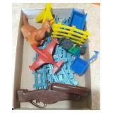vintage toys - train tracks, toy gun, tractor and