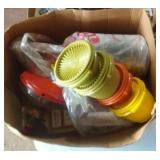 small Tupperware bowls and lids, large toy top,