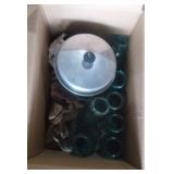 blue glass mason jars, and canner with lid