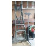 6 ft green ladder and 5ft stand on wheels