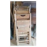 6 matching wood folding chairs and one extra chair