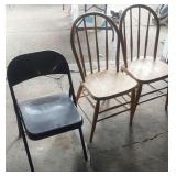 2 kitchen chairs and 1 metal folding chair
