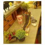 Caribou jaw bone sled, Eskimo figure, horseshoe,