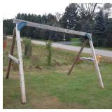 swing set (green brackets) with one swing in