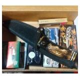 1 fixed knife and 7 folding blade knives