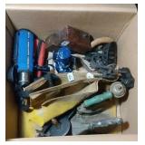 burlap bag, irons, thermos, small lantern, switch