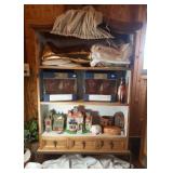 Display cabinet with metal base and contents