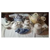 8 tea pots including blue duck and brown cat