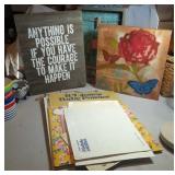 tin signs, clown prints, 1976 calendar and wall