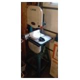 Gizzly G0580 band saw on stand with manual