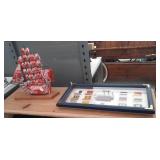 Coca-cola can sailing ship, and nautical flag