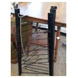 2 black multi rotating hook displays and 2 arched