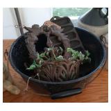 enamel pot with handle, cast iron cherub wall