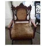 gold upholstered rocking chaire