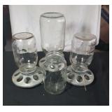 3 chicken feeders and extra Ball jar