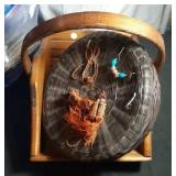 4 baskets with doll and other decor