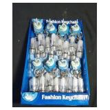 20+ keychains with flashlights and display