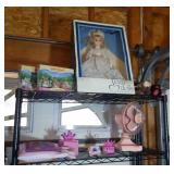 contents of top 2 shelves -"My Press & Dress Doll"