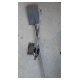 can crusher and garden shovel