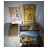 lot of vintage books and oversize postcards