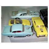 lot of model cars and parts