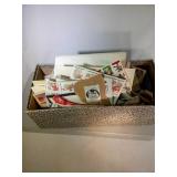 shoebox of mixed stamps