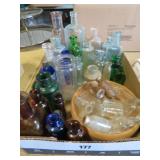 collection of early medicine bottles