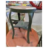 small green metal plant stand
