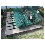 4 rolls of metal fencing, 4 fence posts