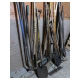 LARGE ASSORTMENT OF HAND TOOLS, SHOVELS RAKES ETC