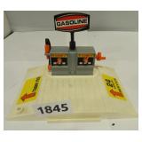 vintage 70's wind up pocket mini car gas pump