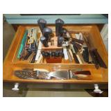 Drawer full of knifes etc