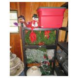 all christmas decor on plastic shelf