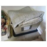 tote of moving/packing blankets