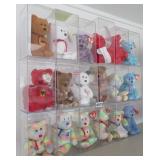 18 beanie babies in plastic cases