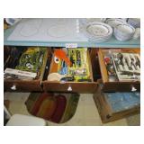 3 drawers of flat ware and kitchen gadgets