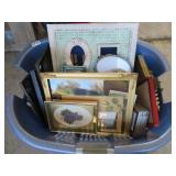 LAUNDRY BASKET FULL OF PICTURE FRAMES