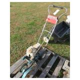 GAS POWERED EDGER-PULLS OVER DID NOT HAVE RUNNING