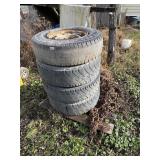 PALLET w/ 4 8-LUG WHEELS AND TIRE CHAINS