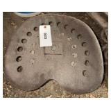 METAL SEAT HOOKED TO A MILK CAN LID